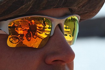 Up close of a face with reflective sunglasses