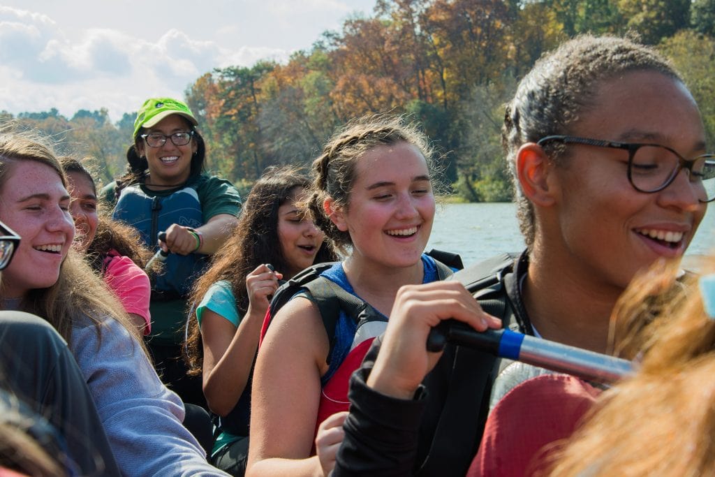 Students sing as they paddle the Chattahoochee River.